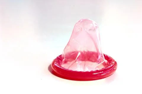 Condom on white background Stock Photos