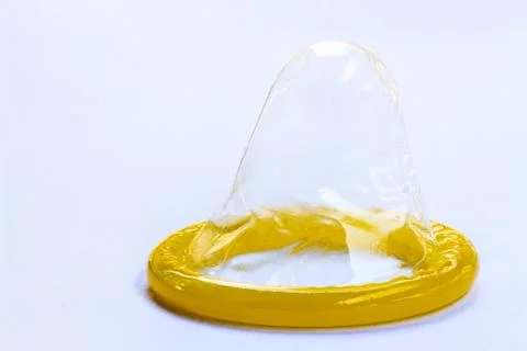 Condom on white background Stock Photos
