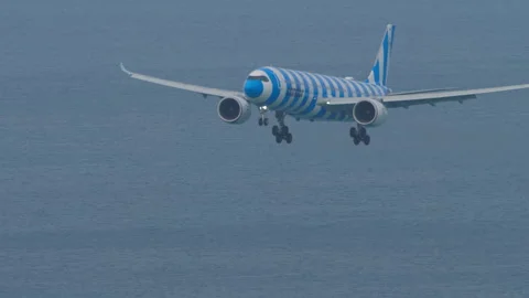Condor Airbus A330-900 D-ANRT on approach over the sea at Phuket Airport Stock Footage 342076124