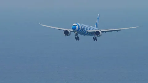 Condor Airbus A330-900 on final landing approach over the sea Stock Footage 339971177