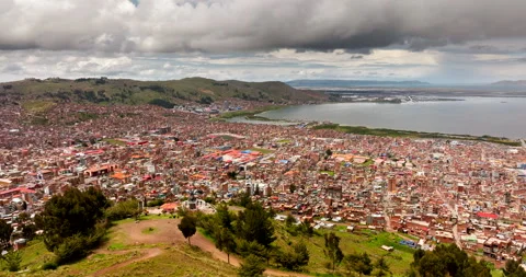 Condor Hill Viewpoint overlooking sprawling Puno city on Lake Titicaca 動画素材 342710469