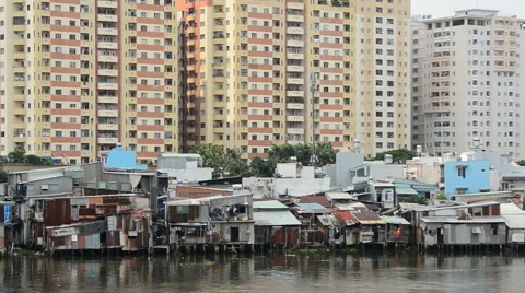 Condos and Shacks on the Saigon River - Ho Chi Minh City (Saigon) Stock Footage 45389206