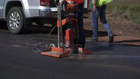 Conducting an examination of the road surface Video stock 236910113