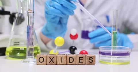 Conducting a Laboratory Experiment Focusing on Oxides and Various Chemical Stock Footage 312370035