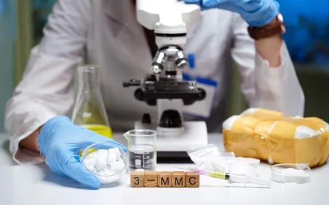 Conducting Laboratory Research Utilizing a Microscope and Various Chemical Stock Photos