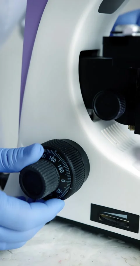 Conducting Scientific Research Utilizing Laboratory Microscope Stock Footage 300468779
