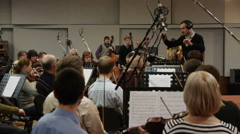 Conductor And Orchestra Stock Footage 61370371