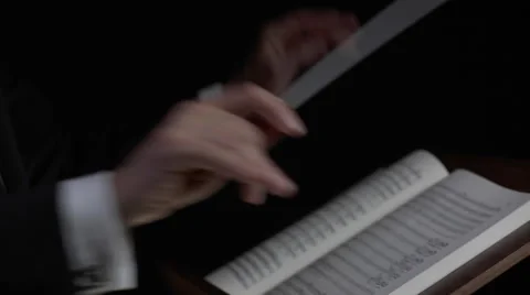 Conductor directing symphony orchestra Stock Footage 61017739