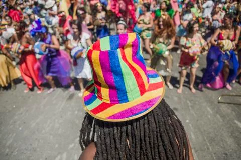 Conductor of Orquestra Voadora with dreadlocks and colorful hat Stock Photos