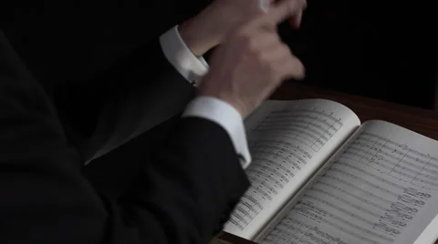 Conductor starts conducting Stock Footage 61019533