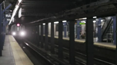 Conductor Through Window on New York Subway During Pandemic - Shallow Depth 4K Stock Footage 133711039