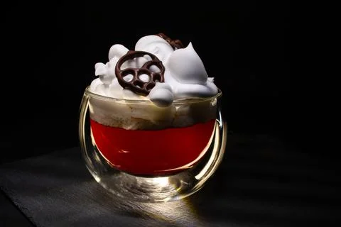 Cone, printed with chocolate on a 3D printer, on a cup of coffee Stock Photos