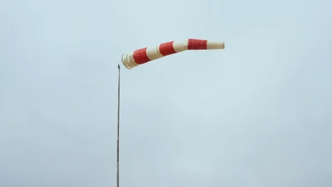 Cone Windsocker. Horizontally flying windsock wind vane due to high wind. 스톡 동영상 125451572