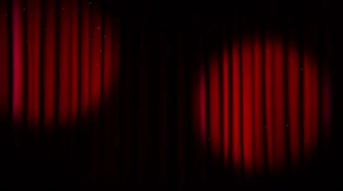 Cones of light moving across the red theater curtain Stock Footage 56962674