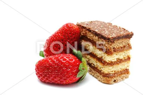 Confection and strawberries Stock Photos