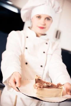 Confectioner Baking A Cake Stock-Fotos