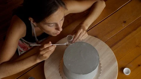 Confectioner cake decorates Stock Footage 93333943