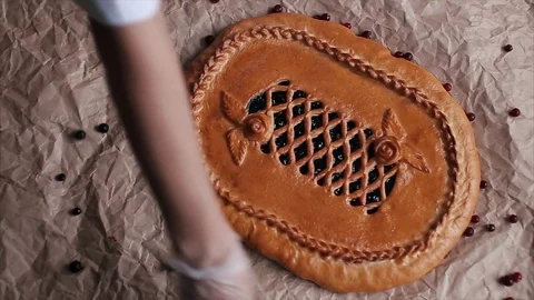Confectioner decorates a berry pie Stock Footage 72530524
