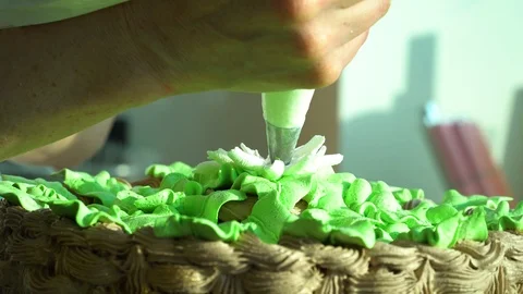 The confectioner decorates a cake Stock Footage 85667287