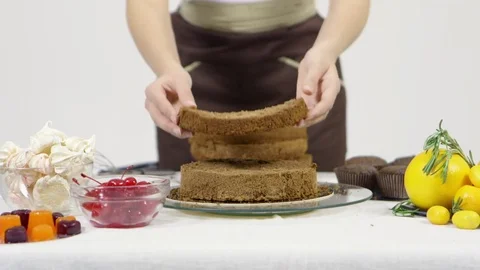 Confectioner decorates cakes Stock Footage 70965037