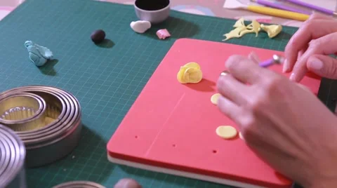 Confectioner, decorating cookies  in the kitchen, 스톡 동영상 61870482