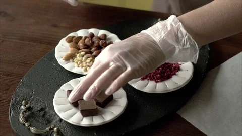 Confectioner makes a handmade chocolate Stock Footage 72528896