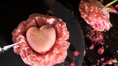 Confectioner is making a dessert in the heart shape for Valentine's Day Stock Footage 126580574
