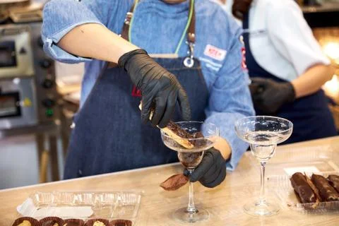 Confectioner Pours Chocolate Eclair With Liquid Nitrogen Stock Photos