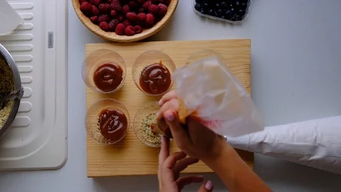 A confectioner prepares a berry trifle Stock Footage 113018832
