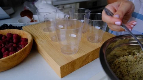A confectioner prepares a berry trifle Stock Footage 113019102