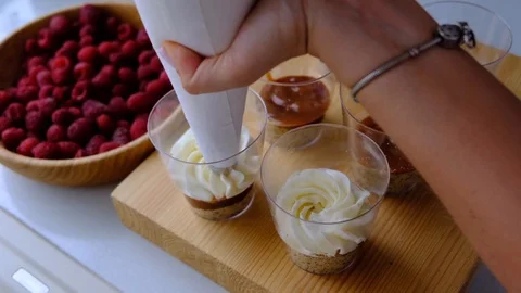 A confectioner prepares a berry trifle Stock Footage 113019129