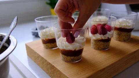 A confectioner prepares a berry trifle Stock Footage 113020219