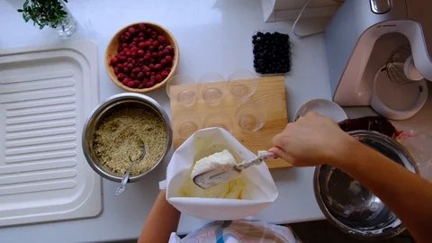 A confectioner prepares cream Stock Footage 113038812