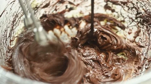 The confectioner preparing mixture for chocolate mousse. Stock Footage 194921347