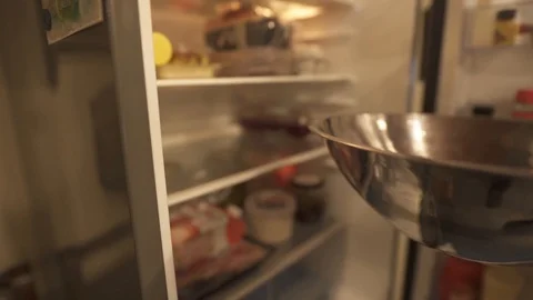 The confectioner puts the egg whites to rest in the fridge Slog Stock Footage 127095671