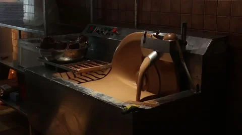 Confectioner working for the chocolate machine Stock Footage 63167100