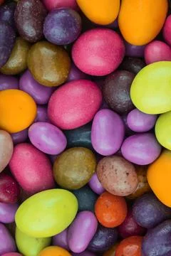 Confectionery background sweets with multicolored sugar icing dragee green .. Stock Photos