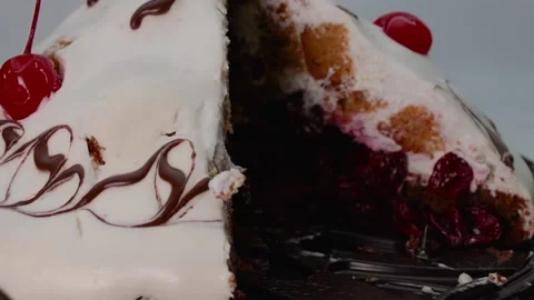 Confectionery concept. Cherry cake covered with white cream decorated Stock Footage 170640147