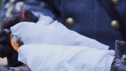 Confederate soldier close up lighting torch Stock-Footage 90562032