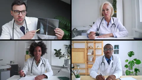 Conference call doctors working or studying together at tables in clinic spbas Stock Footage 169863155