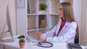Conference call with physician Stock Footage 85628611