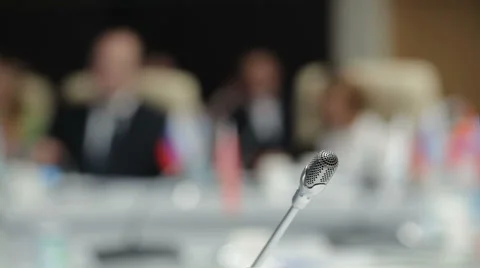 A conference with a mic in front Video stock 64735133