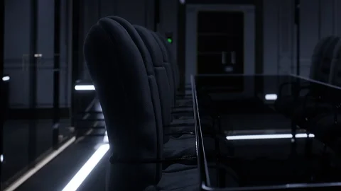 Conference room setup in dark environment with modern chairs and glass table Video stock 345005615