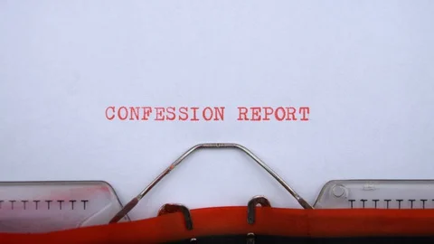 Confession report - phrase printed on an old typewriter in red letters Stock-Footage 128400580