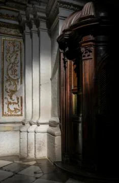 Confessional in the Granada Cathedral of the Incarnation. Stock Photos