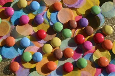 Confetti and sweets Stock Photos