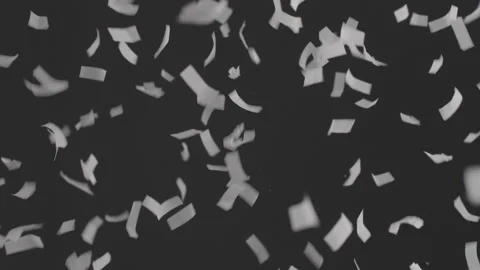 Confetti cannon exploding confetti fluttering down Video stock 163948541