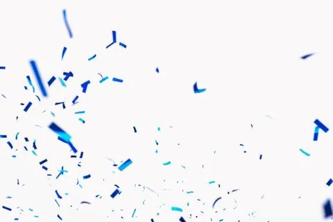 Confetti from crackers. Blue elements on a white background. Shot of confetti Stock Photos
