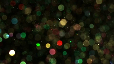 Confetti explosion with color reflections in defocus. Video stock 87402366