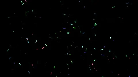 Confetti falling down creating a celebratory and festive background Stock Footage 327567708